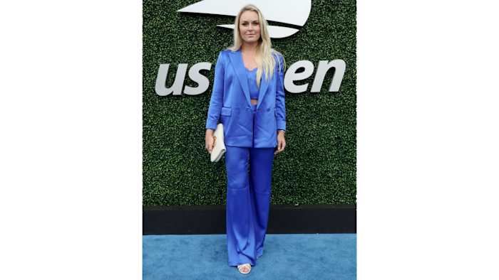 Lindsey Vonn poses at the US Open in a blue silk set.